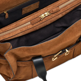 Close up of the brown bag, showing texture of the suede fabric