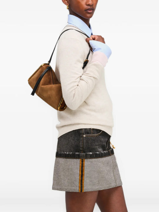 Brown bag worn by a person, showing the bag fit