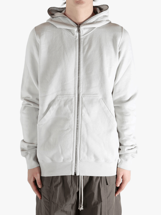 White hoodie worn by a person, showing the hoodie fit