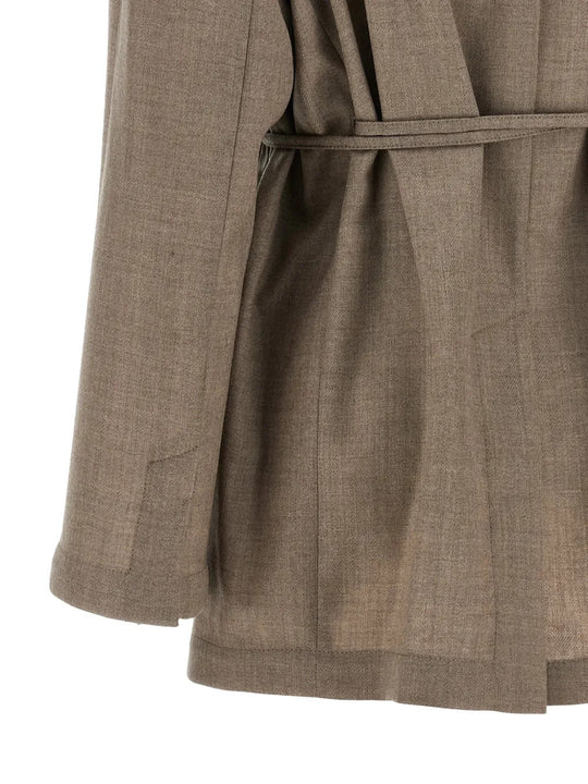 Close up of Tan jacket, showing texture of the 100% virgin wool made fabric