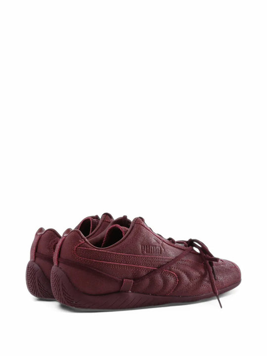 Burgundy shoes, side view