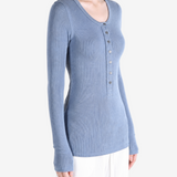 Blue shirt worn by a person, showing the shirt fit