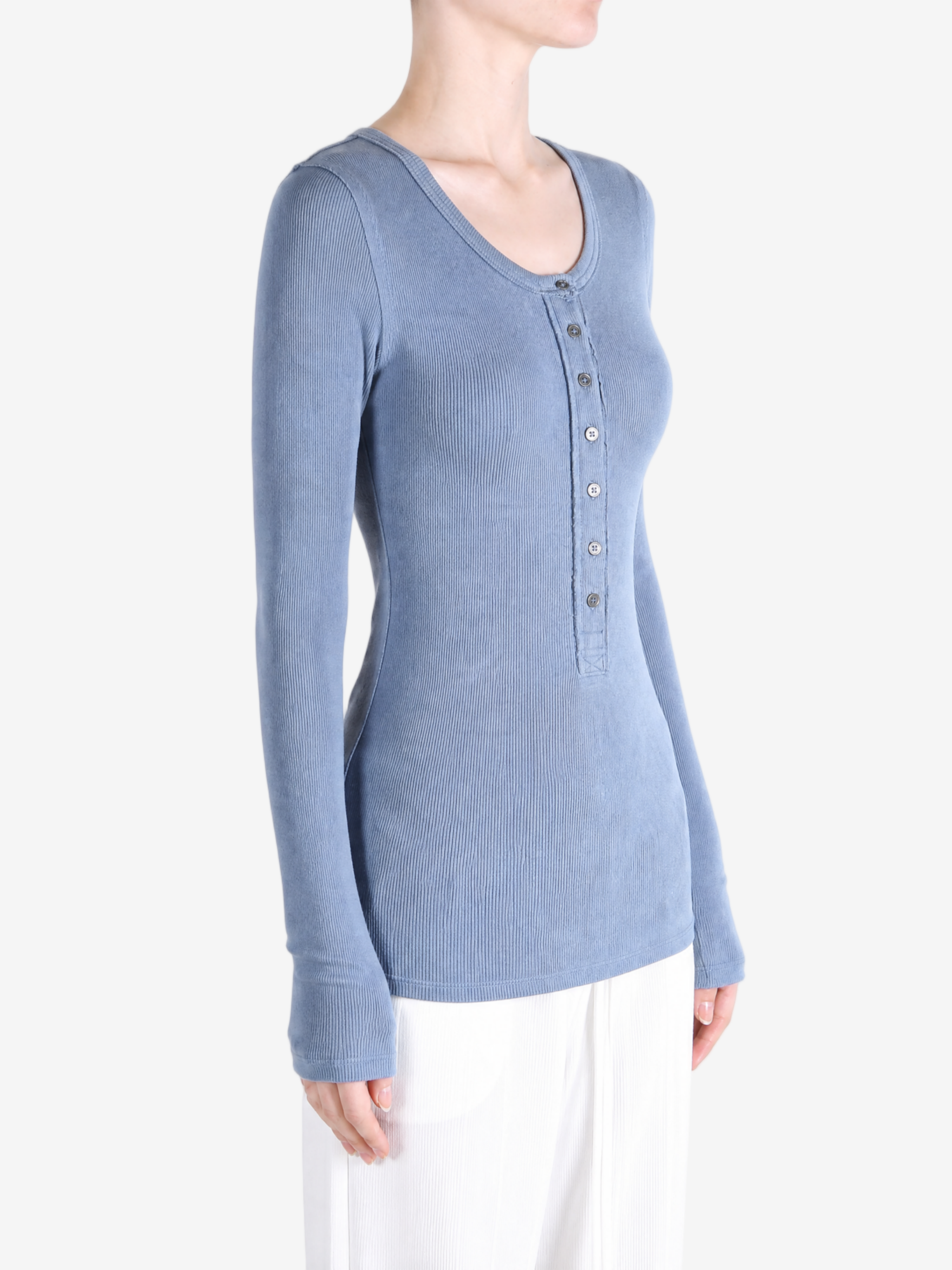 Blue shirt worn by a person, showing the shirt fit