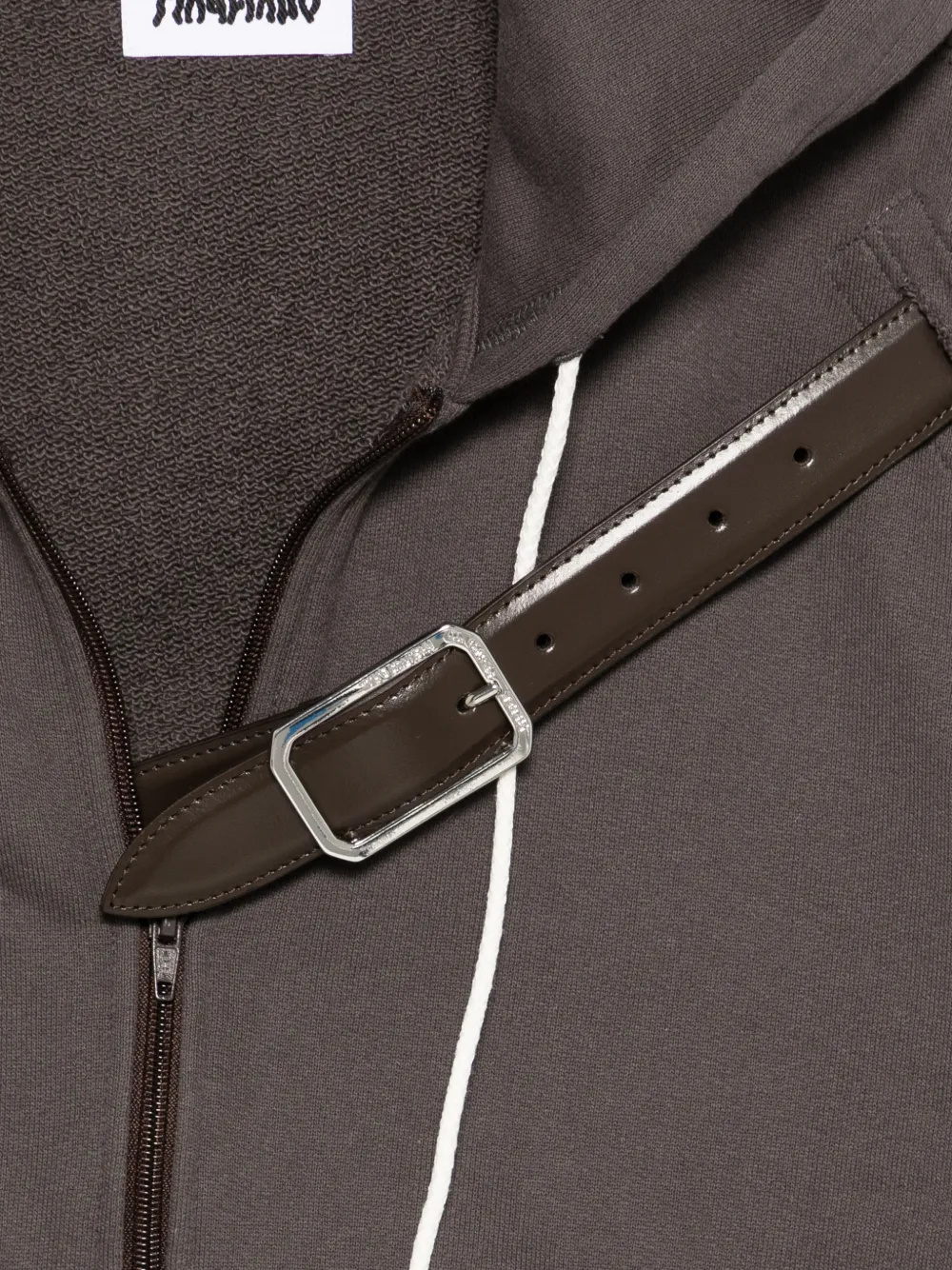 Close up of brown hoodie, showing the detial of the collar belt