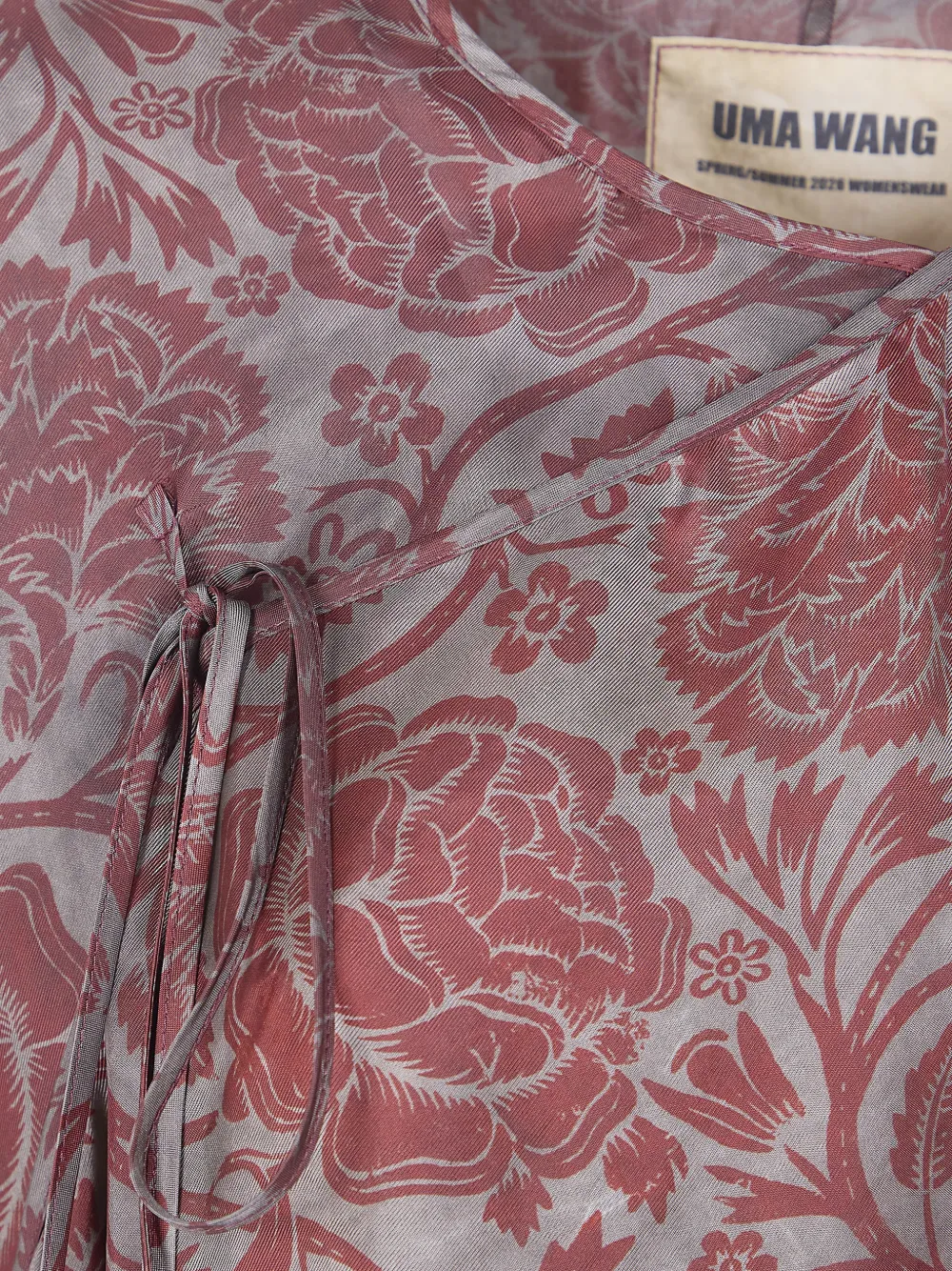 Close up of red top, showing texture of the viscose fabric
