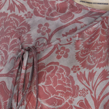 Close up of red top, showing texture of the viscose fabric