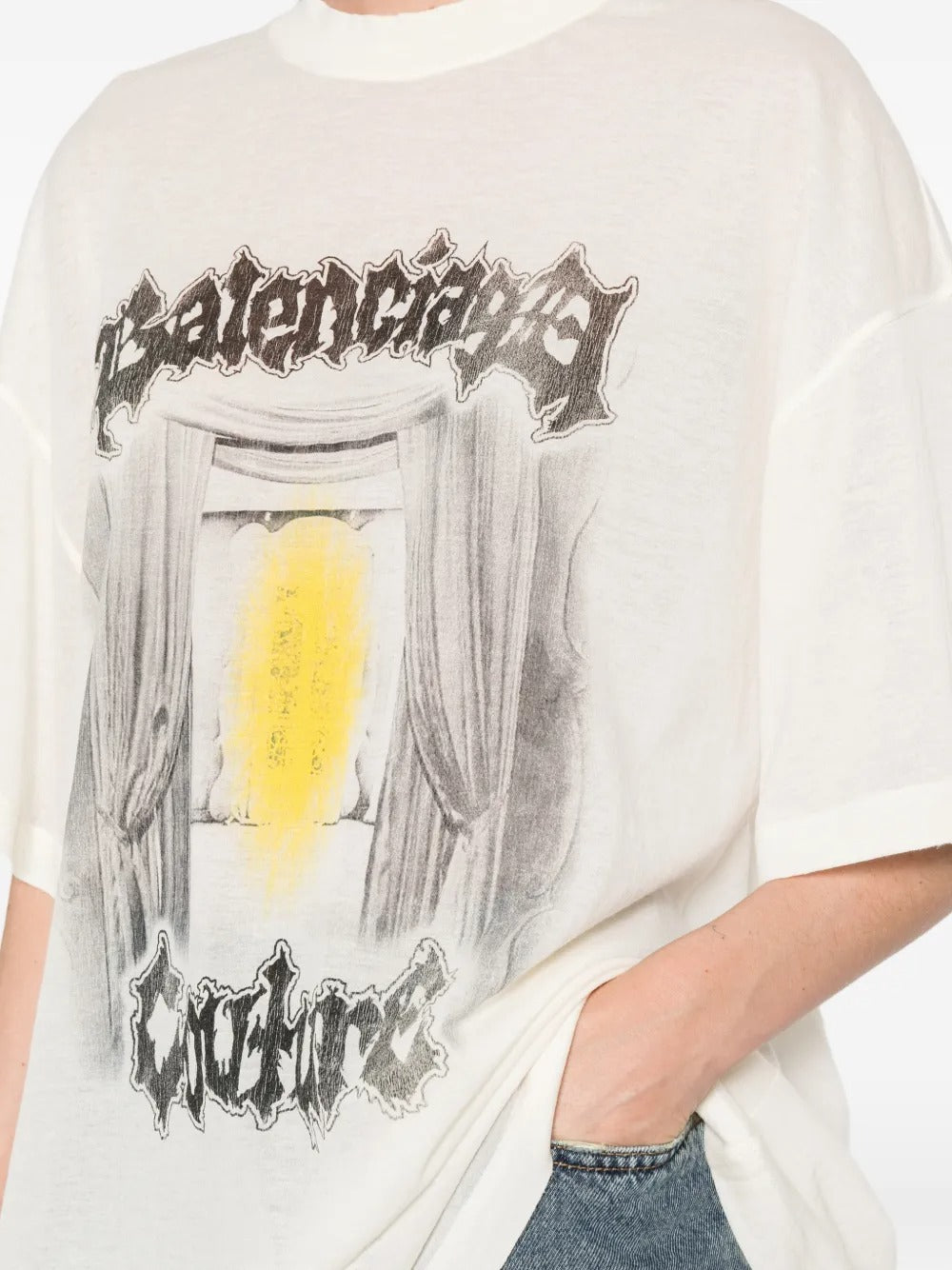 Close up of white t-shirt, showing texture of the cotton fabric