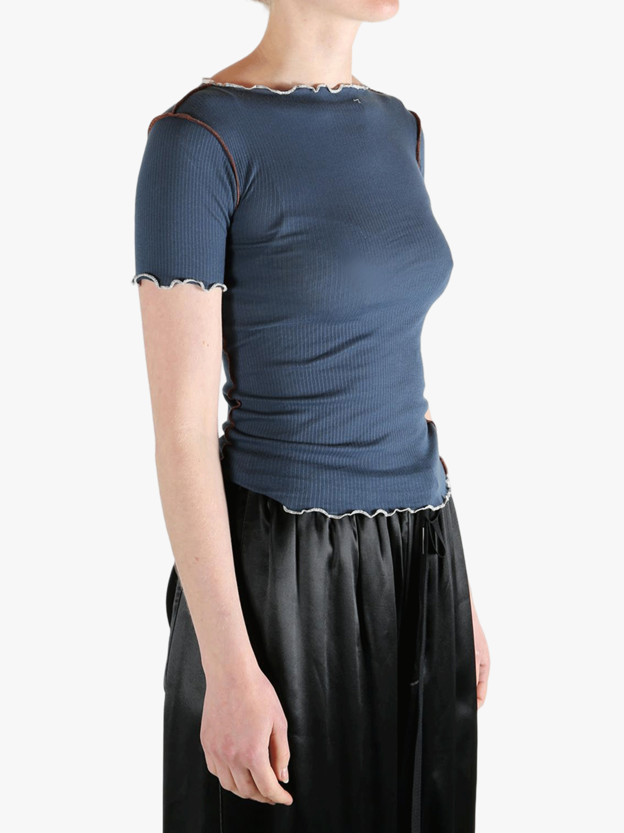 Blue t-shirt worn by a person, showing the shirt's fit