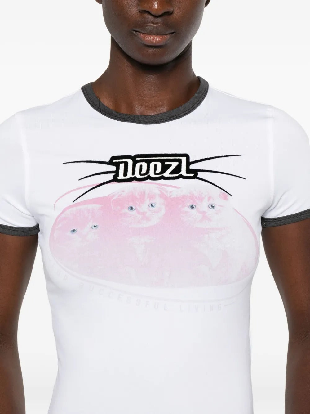 Close up of the white t-shirt, showing texture of the cotton fabric