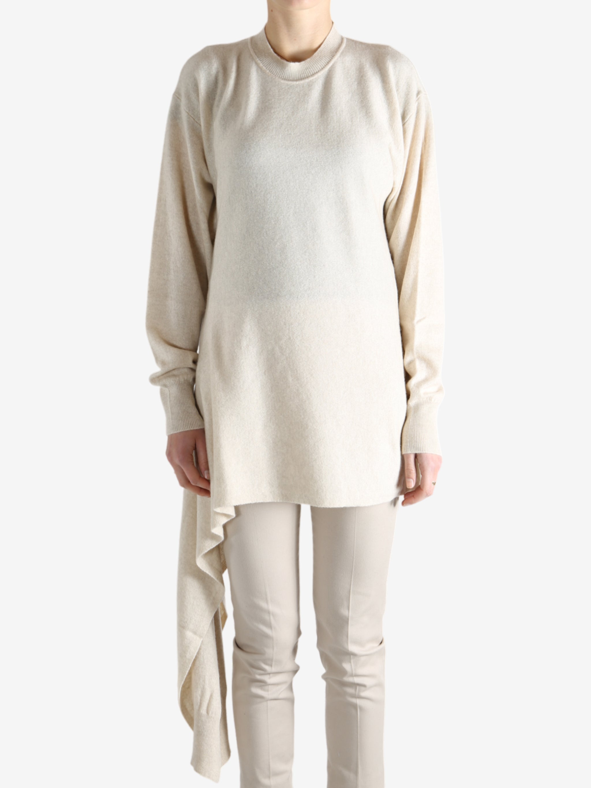 White top worn by a person, showing the top's fit