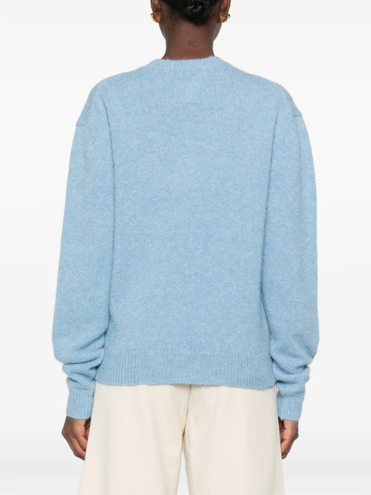 Blue knitwear, full body view