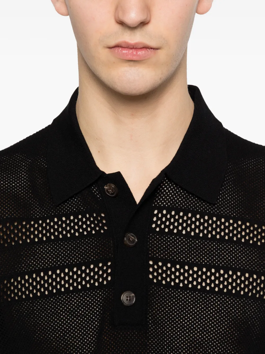 close up of black knitwear, showing texture of the viscose  fabric