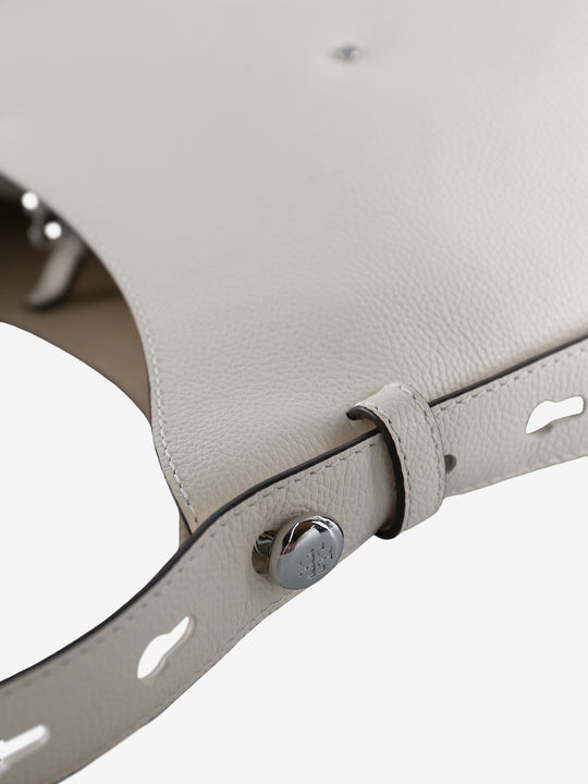 Close up of the white bag, showing texture of the leather fabric