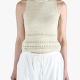 White vest worn by a person, showing the vest's fit
