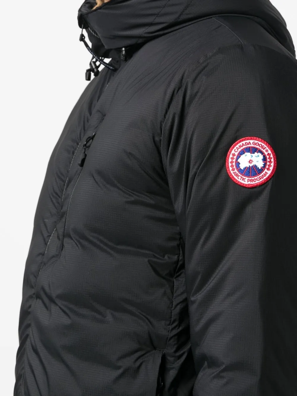 Black hoodie worn by a person, showing the hoodie fit
