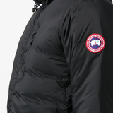 Black hoodie worn by a person, showing the hoodie fit