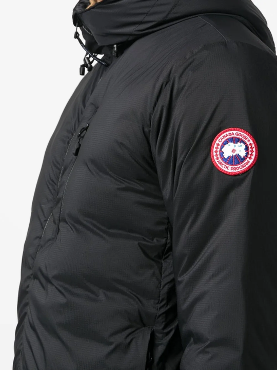 Black hoodie worn by a person, showing the hoodie fit