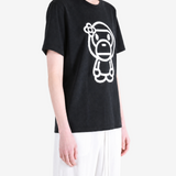 Black t-shirt worn by a person, showing the t-shirt fit
