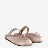 Pink mules, side view