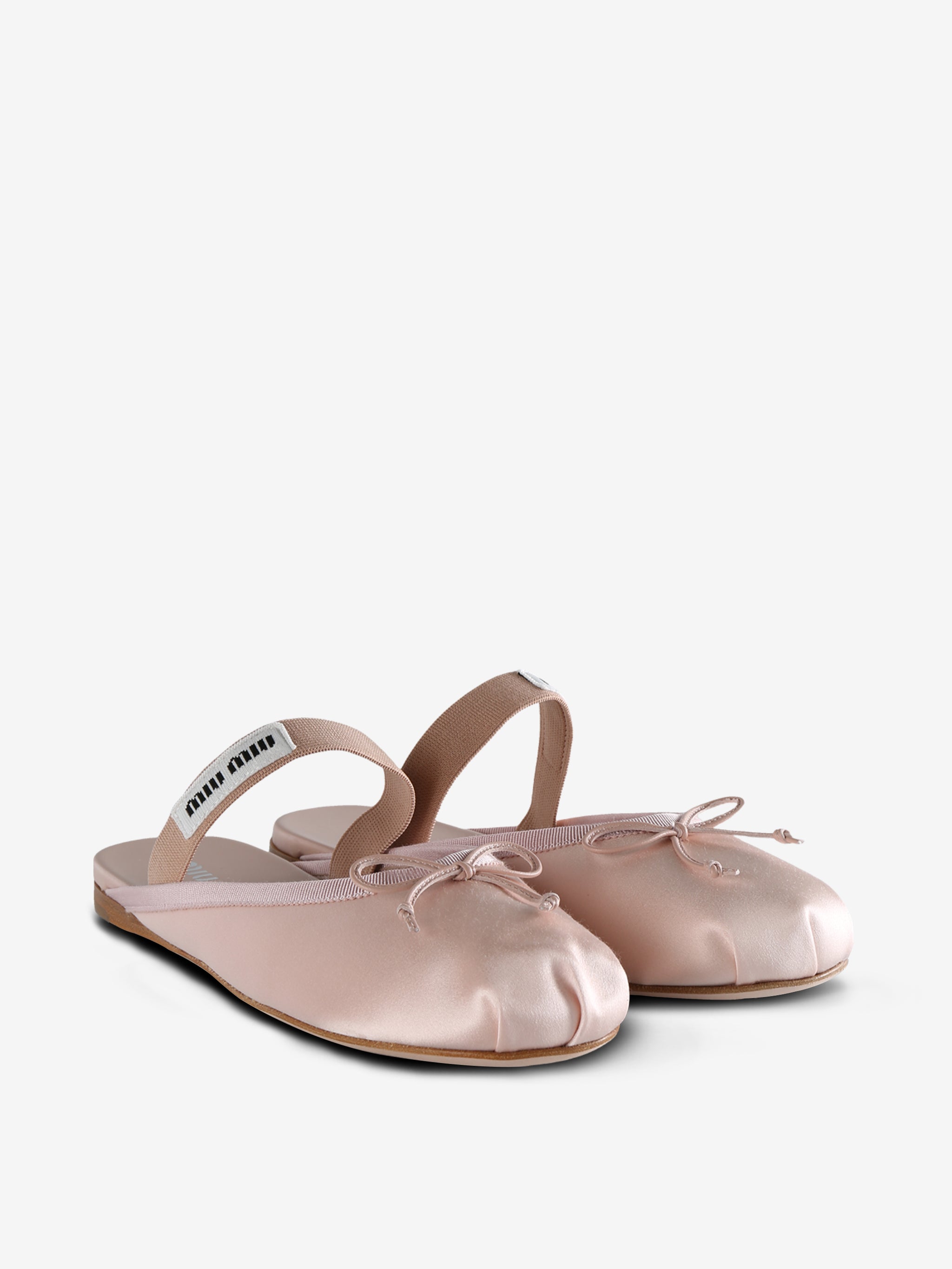 Pink mules, side view