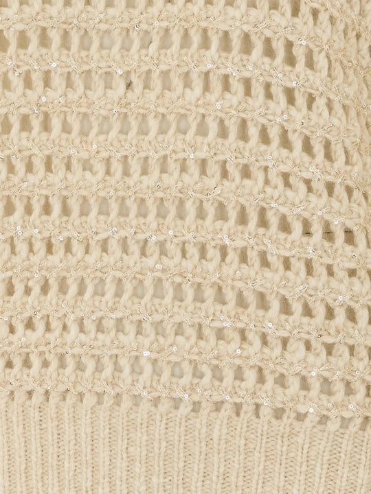 Close up of Tan hoodie, showing texture of the 38% lambs wool/ 31% cashmere/ 15% polyamide/ 8% mohair/ 8% polyester made in fabric