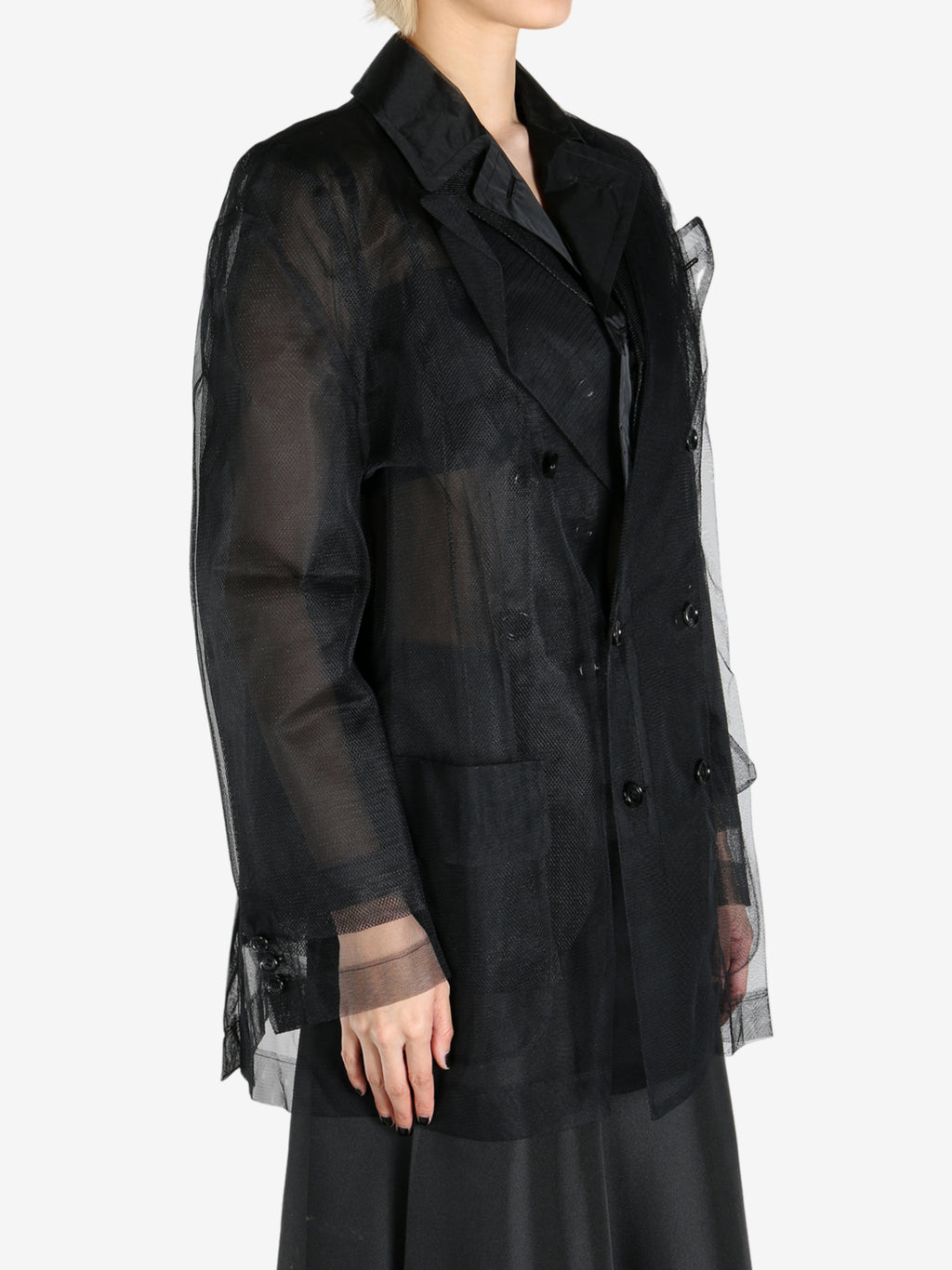 Black jackets worn by a person, showing the jackets fit