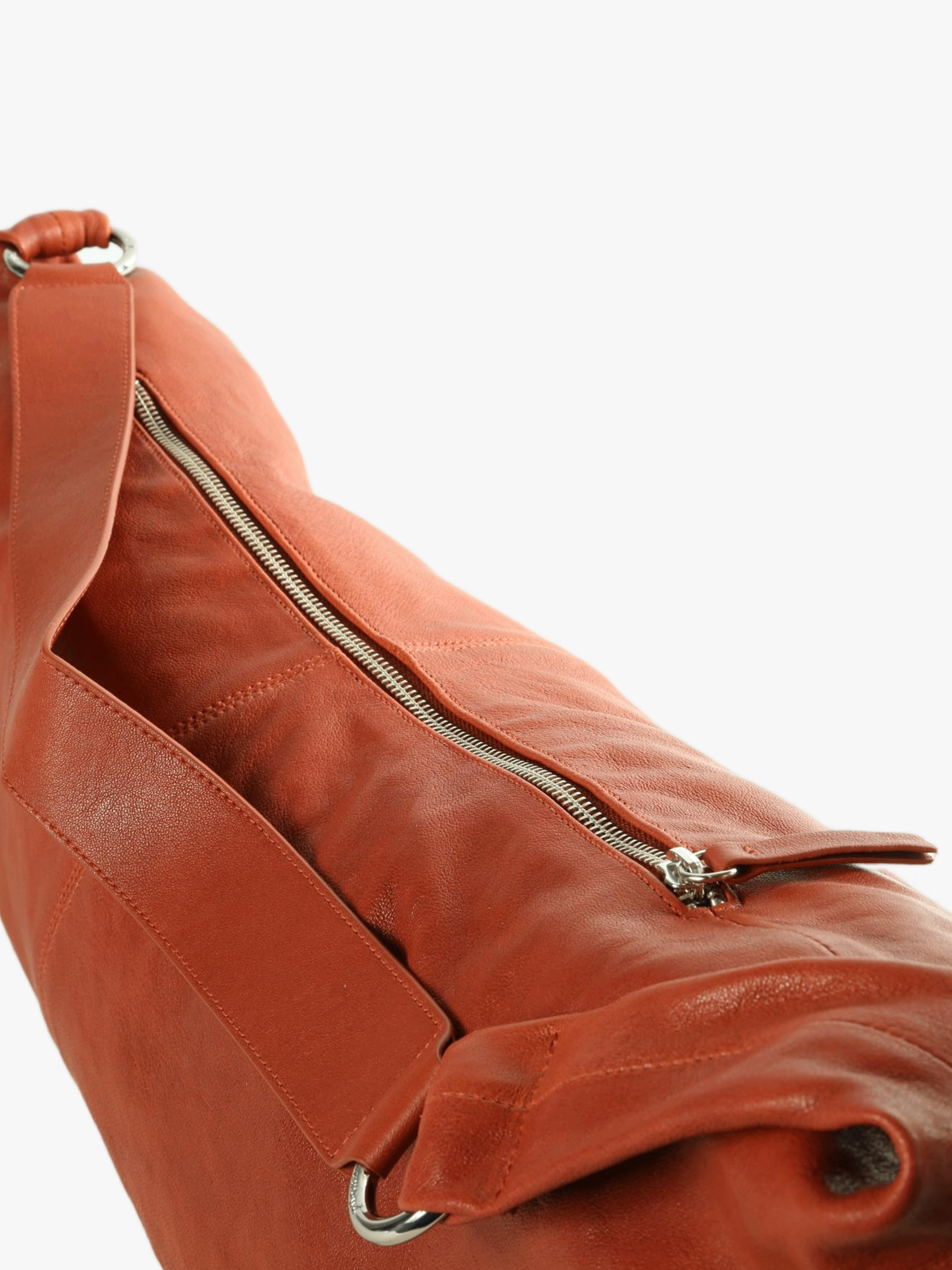 Close up of brown bags, showing texture of the leather fabric