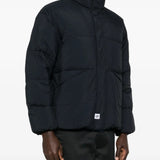 Black jackets worn by a person, showing the jackets fit