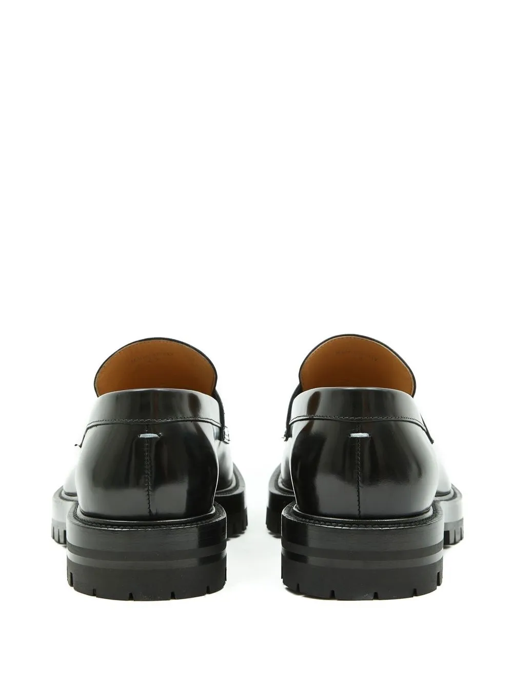 Black loafer, back view