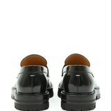 Black loafer, back view