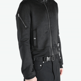 Black jackets worn by a person, showing the jackets fit