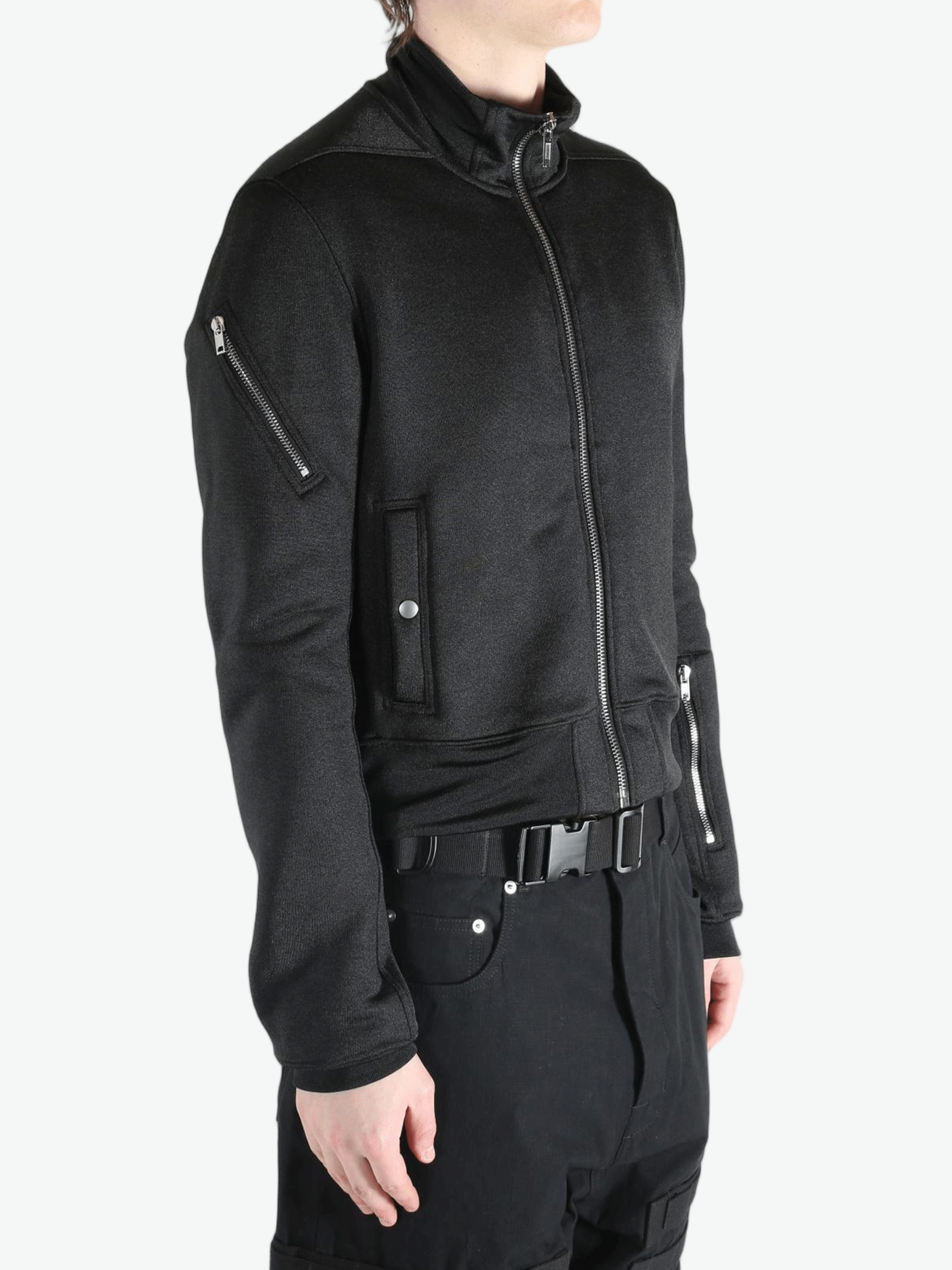 Black jackets worn by a person, showing the jackets fit