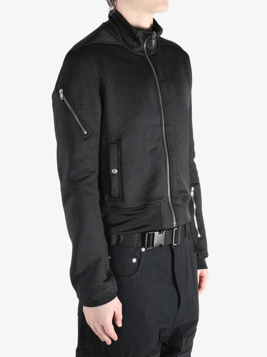 Black jackets worn by a person, showing the jackets fit