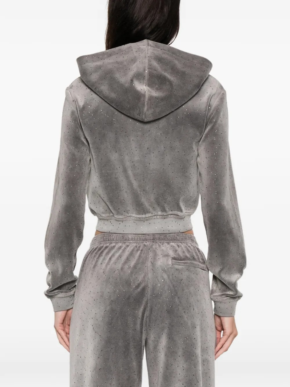 Grey hoodie worn by a person, showing the hoodie's fit