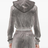 Grey hoodie worn by a person, showing the hoodie's fit