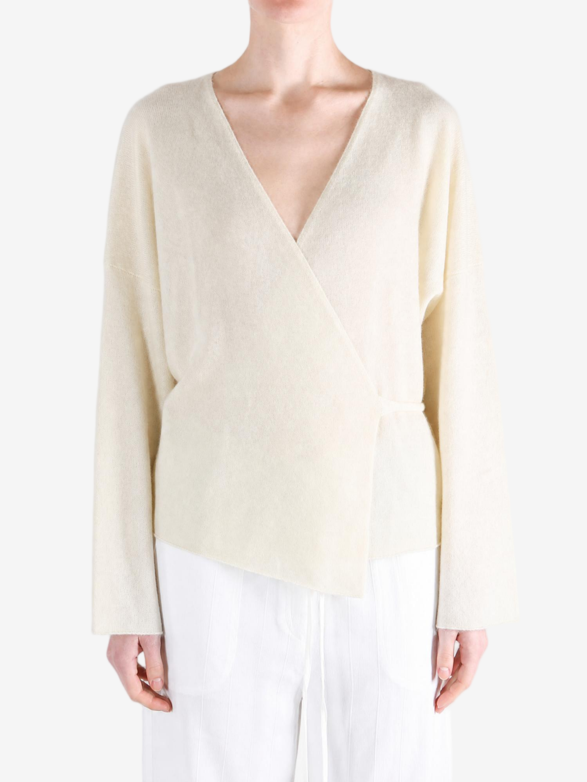 Tan jacket worn by a person, showing the jacket fit