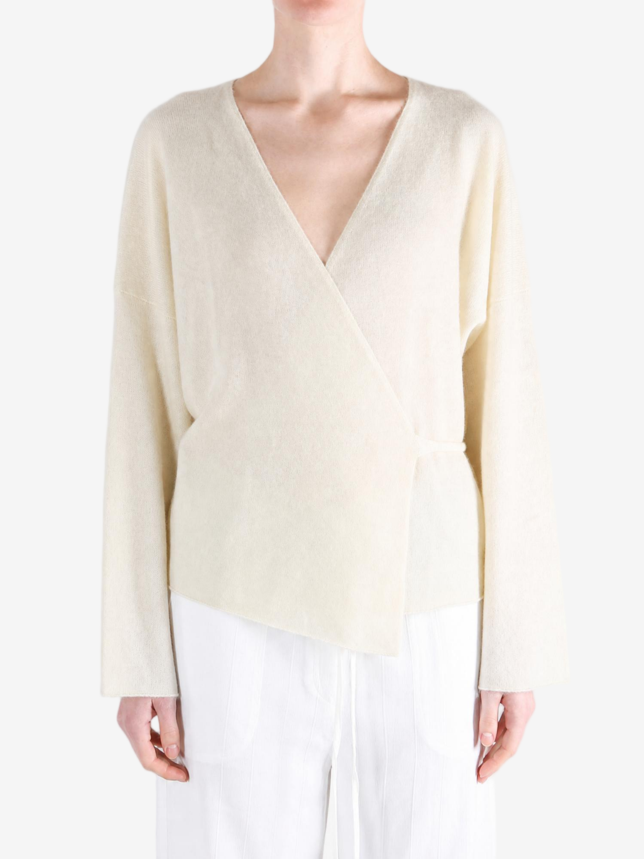 Tan jacket worn by a person, showing the jacket fit