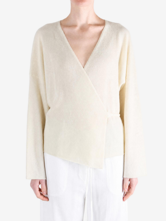 Tan jacket worn by a person, showing the jacket fit