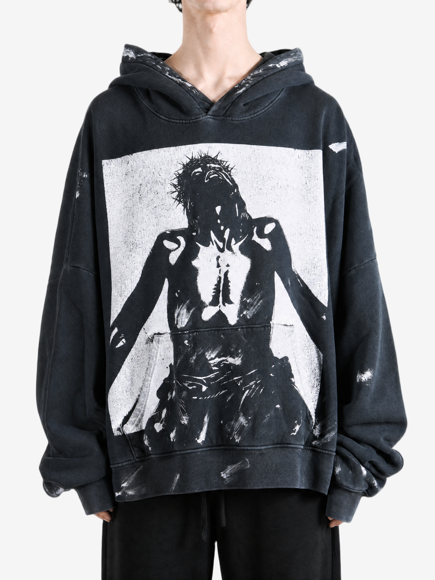 Black hoodie worn by a person, showing the hoodie fit