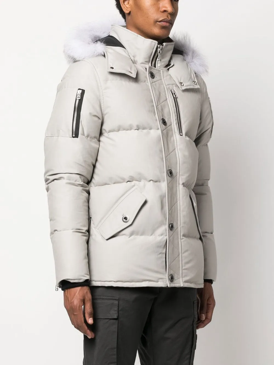 Gray coat worn by a person, showing the coat's fit