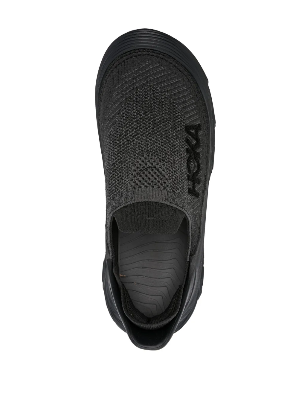 Black sneakers, vertical view