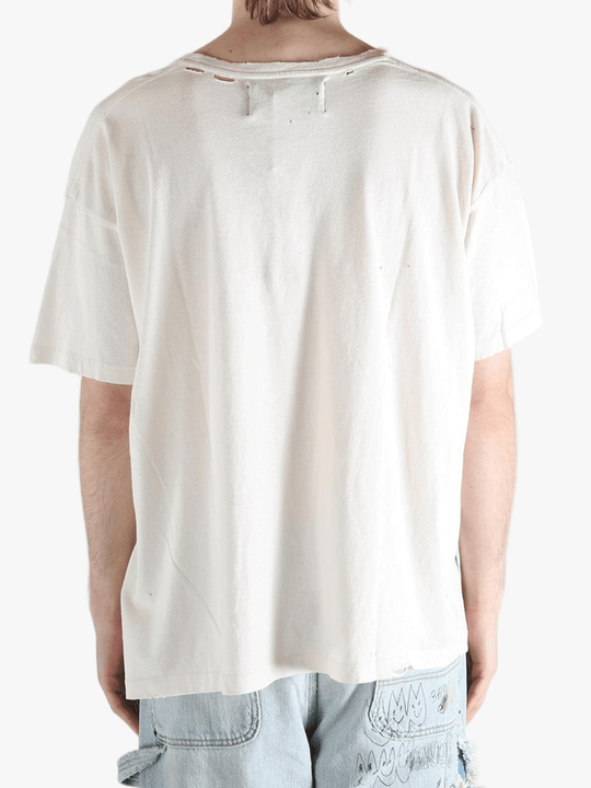 White t-shirt worn by a person, showing the shirt's fit