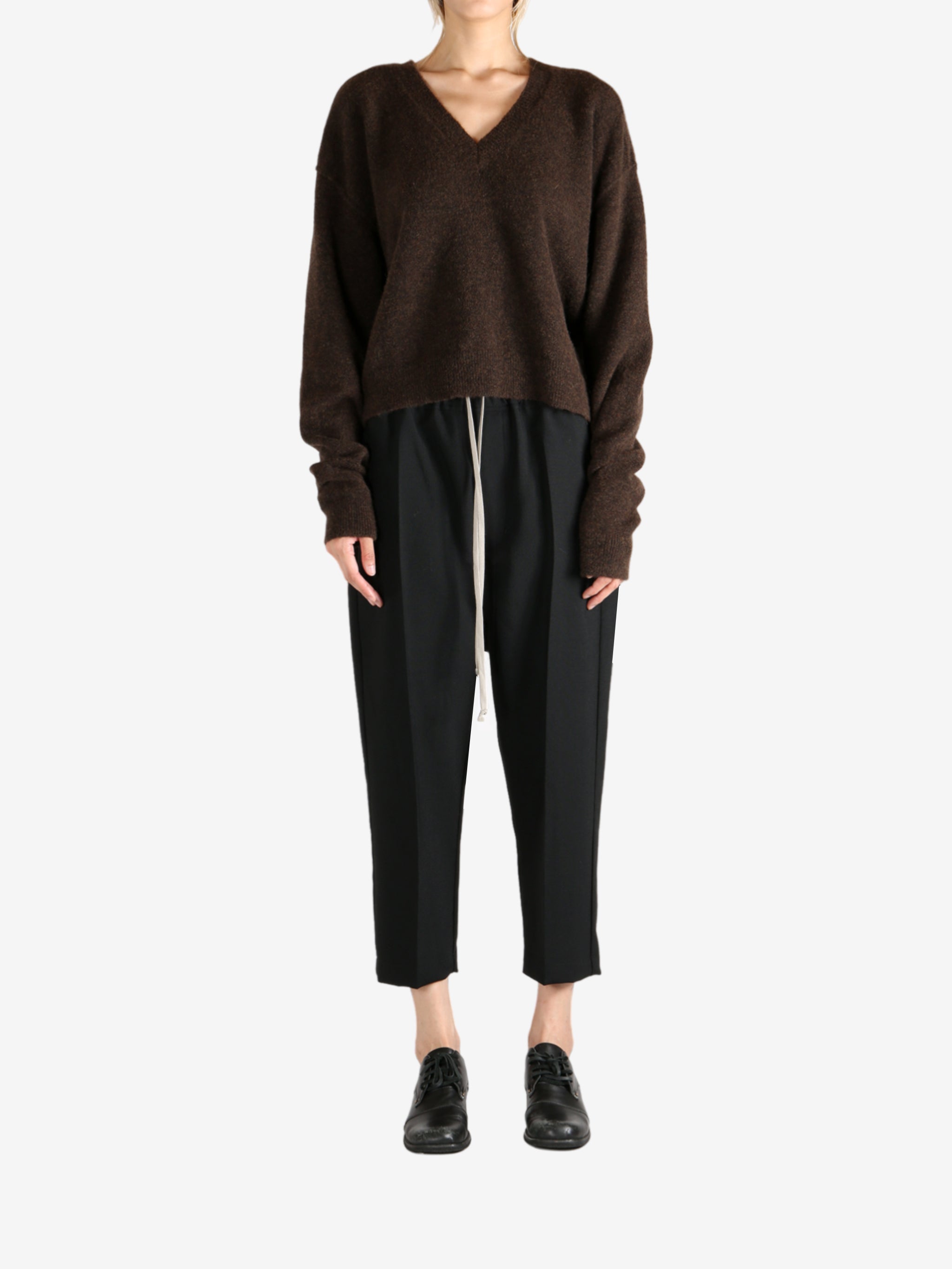 Brown knitwear, full body view