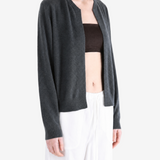 Grey hoodie worn by a person, showing the hoodie fit