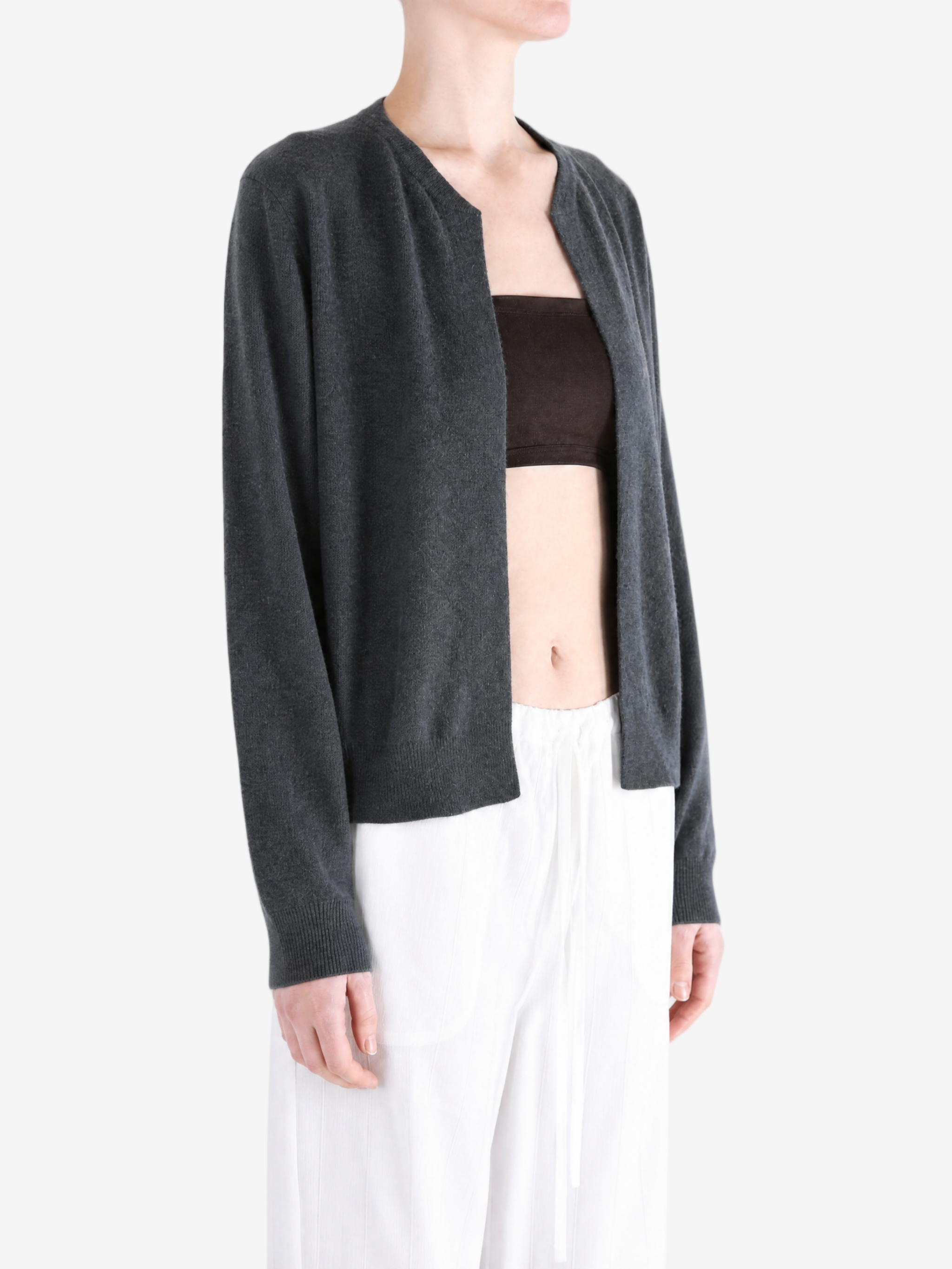 Grey hoodie worn by a person, showing the hoodie fit