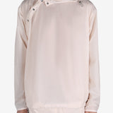 Pink jacket worn by a person, showing the jacket's fit