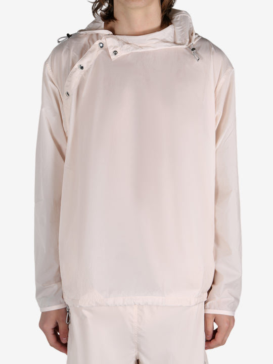 Pink jacket worn by a person, showing the jacket's fit