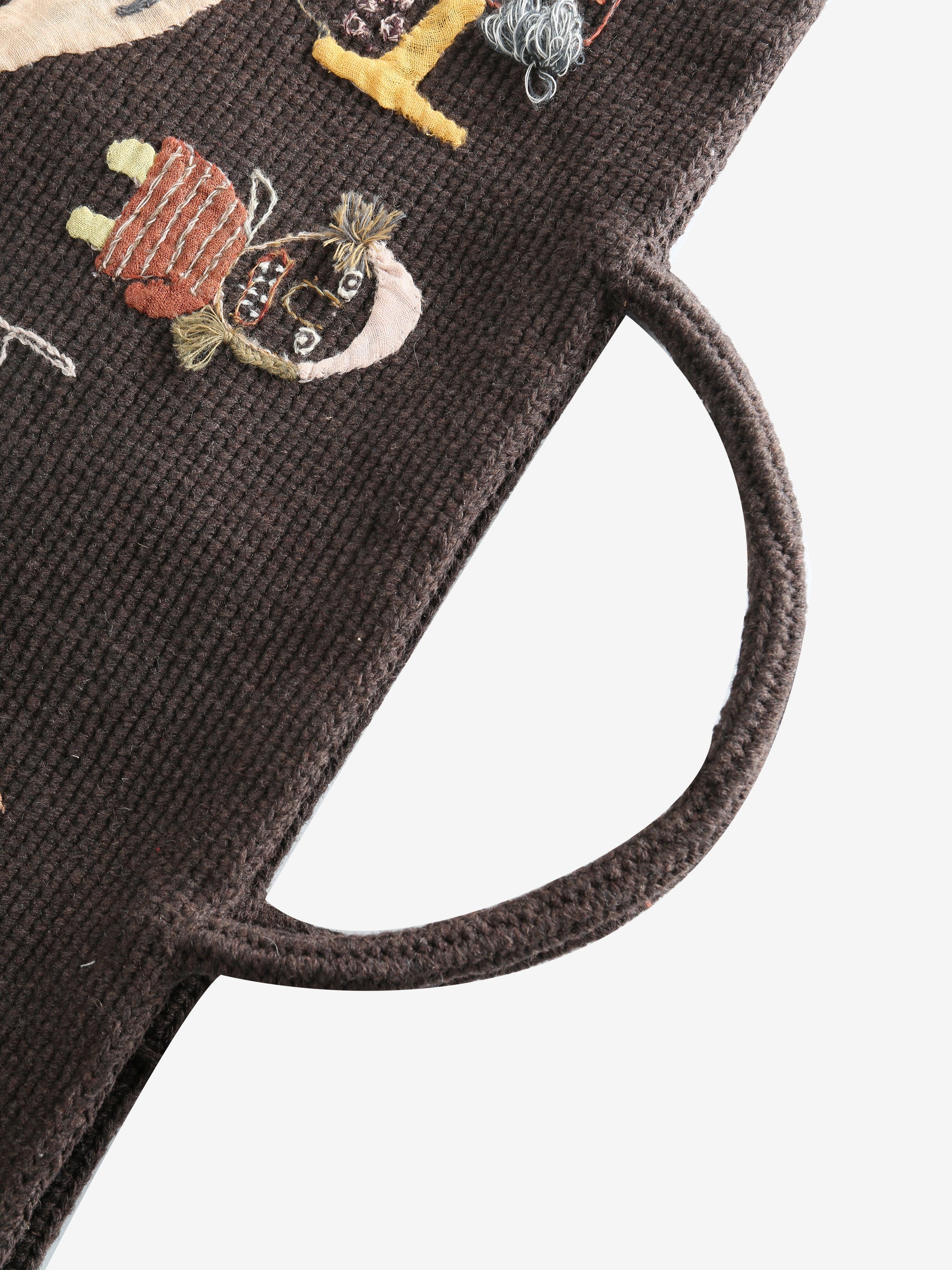 Close up of brown bag,showing texture of the wool fabric