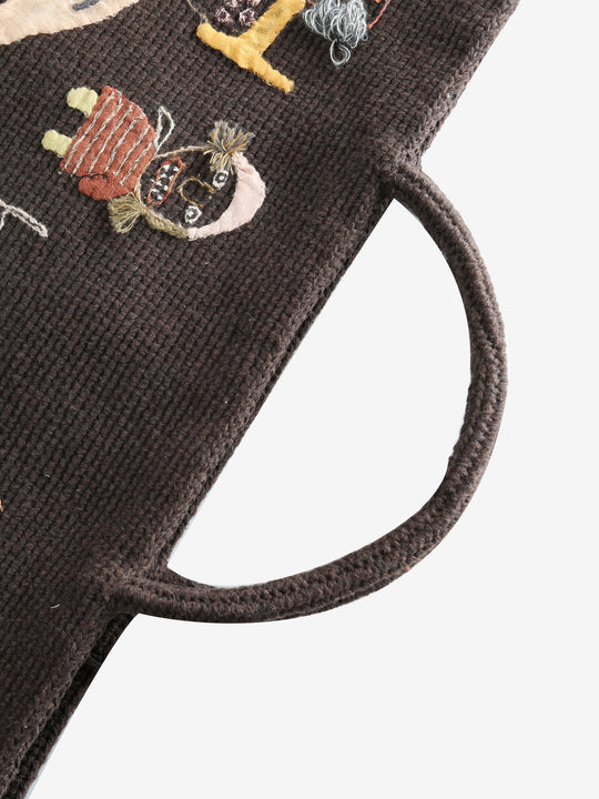 Close up of brown bag,showing texture of the wool fabric