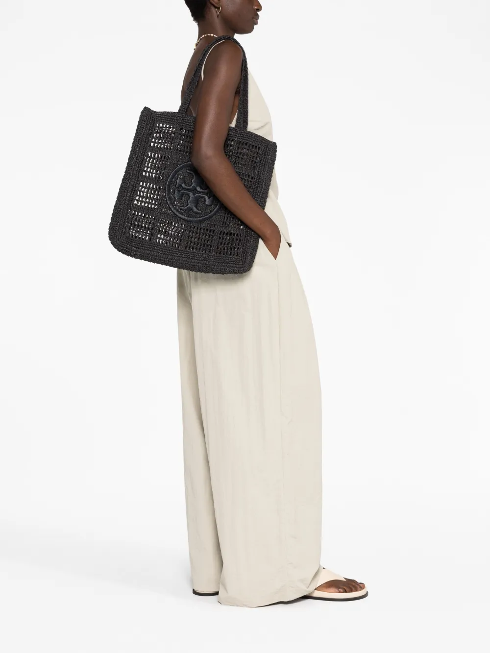 Black bag worn by a person, showing the bag's fit